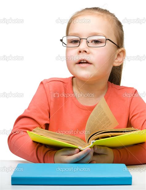Cute Little Girl Reading Book Stock Photo By ©kobyakov 13380345