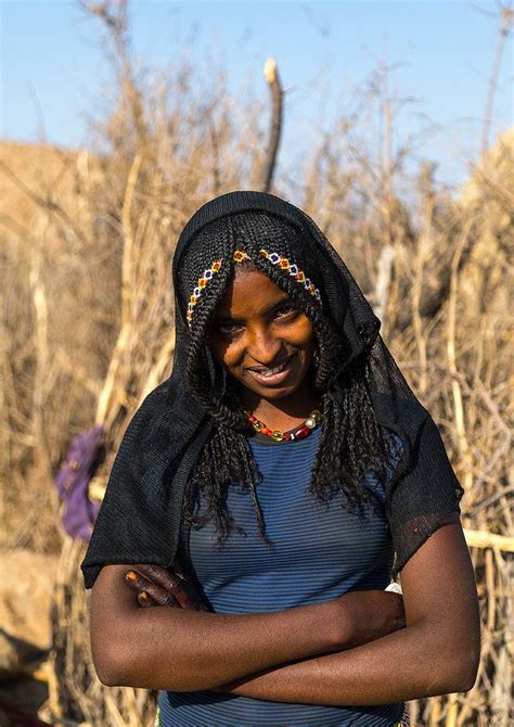 Portrait Of A Smiling Afar Tribe Girl With Braided Hair Afar Region Chifra Et Natural Hair