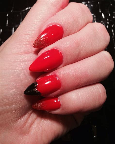 Red Stiletto Nails With Black Heart And Gold Glitter Red Nails Red