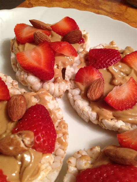 My Fav Snack Rice Cakes Wpbalmonds And Sliced Strawberries Healthy