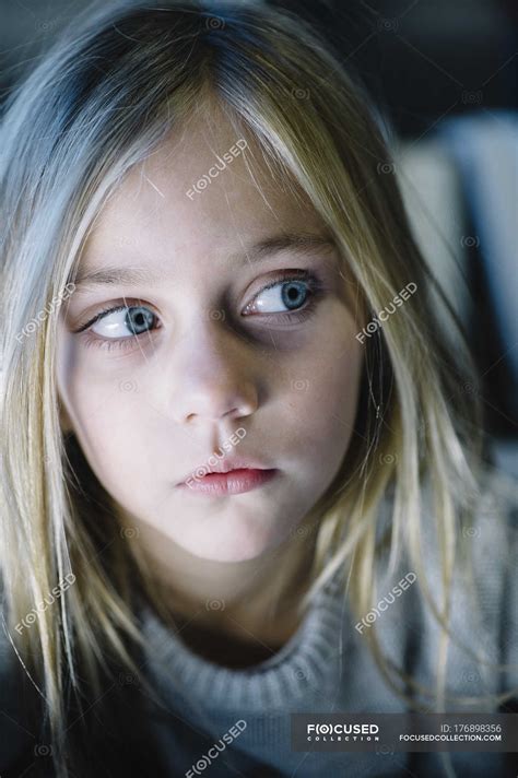 Beautiful Blonde Preteen Girl With Big Blue Eyes — Looking Away Candid