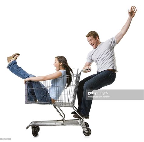 Man Pushing Shopping Cart With Girlfriend Inside Photo Getty Images