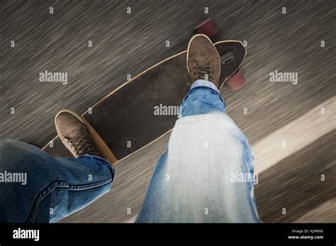 Detail Of A Young Man Feet Riding A Skateboard Stock Photo Alamy