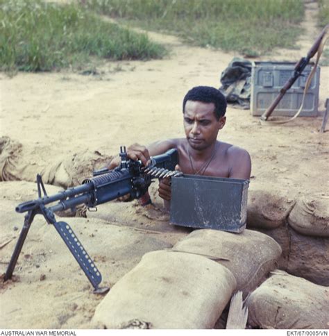South Vietnam 1967 Digger Feeding Ammunition Belt Into A 762mm Gpmg