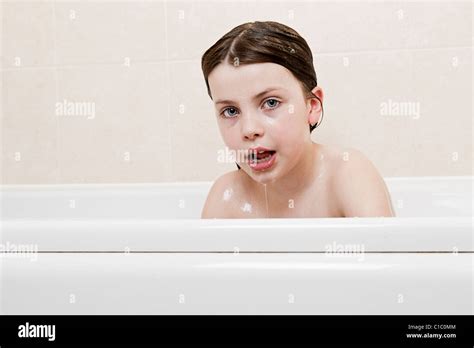 Shot Of A Young Girl In The Bath Stock Photo Alamy