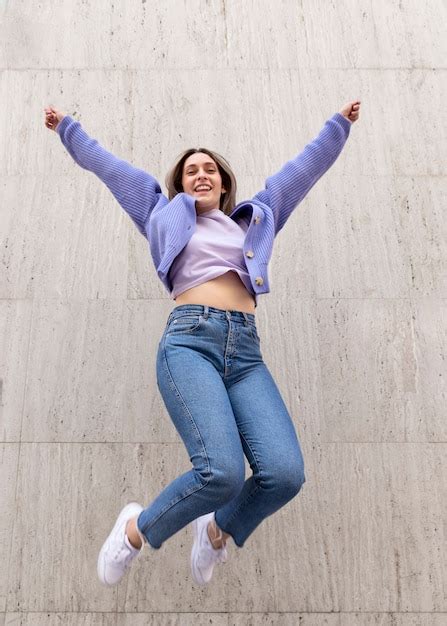 Free Photo Happy Woman Outdoors Jumping Up