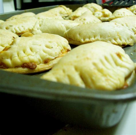 Wet the edges of the pie crusts with a little water, and fold over the circle in half. Tyler's Taste Tests: Baked Chicken Empanadas
