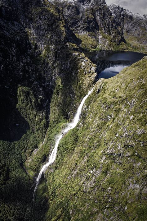 sutherland falls flowing from lake quill high up in fiordland [oc] [3456x5184] with images