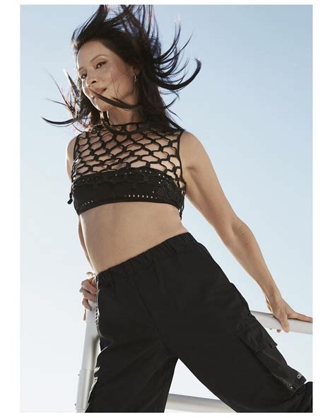 Lucy Liu Showed Off Her Sexy Legs And Tits In Womens Health Magazine