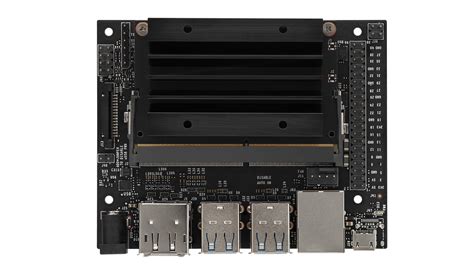 Developer kit contents nvidia jetson nano module and carrier board small paper card with quick start and support information NVIDIA Jetson Nano - одноплатный компьютер с поддержкой ИИ ...