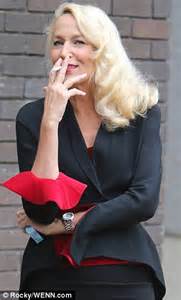 Jerry Hall Puffs On A Cigarette Outside Itv Studios While Wowing In