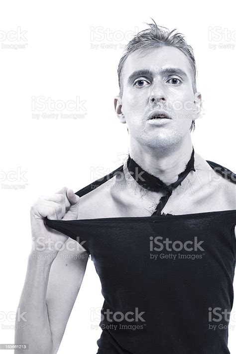 Young Man Tearing At His Shirt Stock Photo Download Image Now Adult
