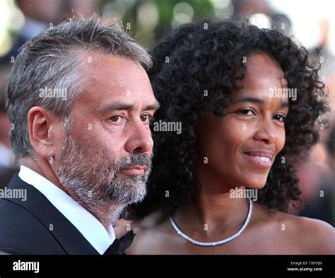 Luc Besson And His Wife Virginie Silla Arrive On The Red Carpet Before