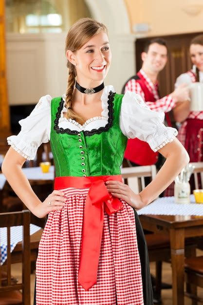 Premium Photo Young People In Traditional Bavarian Tracht In