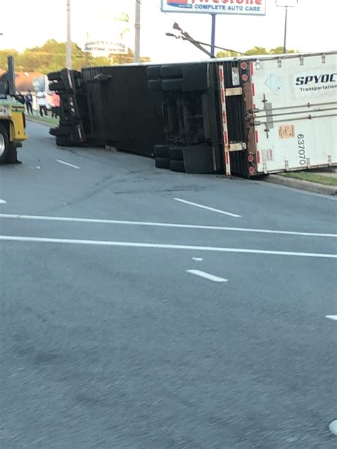 Tractor Trailer Overturns At West Gate City Boulevard Intersection In
