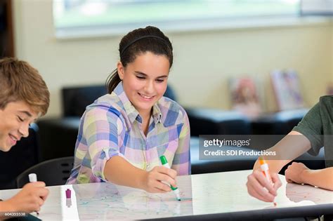 Female High School Student Drawing At An Animation Makerspace Station