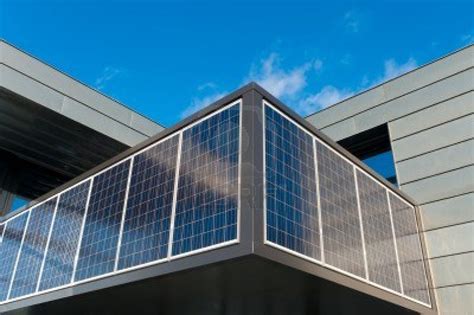 Entrance Of A Modern Office Building With Solar Panels For Energy
