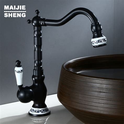 Give your kitchen a quick upgrade by changing your own sink tap. Black stand basin mixer tap black kitchen tap Black ...