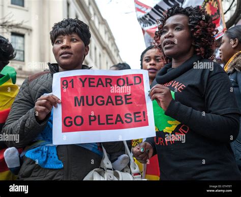 Activists Protest Outside The Zimbabwean Embassy In London Against Zimbabwe President Robert