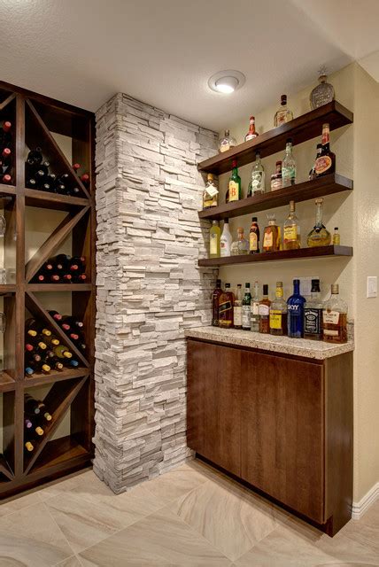 If your floor slopes or is uneven, as most basement and garage floors do, you can easily shim under the legs to level out your shelves. Basement Bar Shelving - Transitional - Basement - denver ...