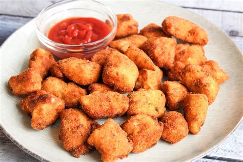 The best homemade chicken nuggets made with real ingredients! Homemade Chicken Nuggets | Just A Pinch Recipes