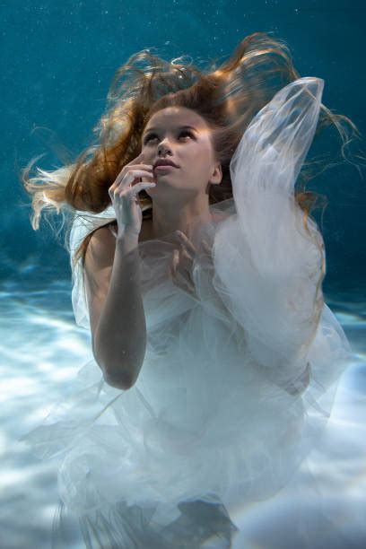 Woman Underwater Dress Stock Photos Pictures And Royalty Free Images