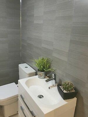 Grey never overwhelms the greater picture, and your personal effects and preferred splashes of color will only enhance the overall effect of your bathroom abode. Graphite grey modern tile effect bathroom panels shower ...