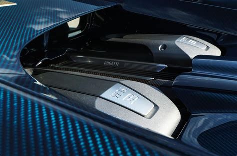 To follow in the footsteps of a car top gear magazine named the greatest from the last 20 years then, requires the chiron's engine cooling pipes have the same diameter as a fire brigade's spray lance. Bugatti Chiron engine bay | Bugatti chiron, Bugatti ...