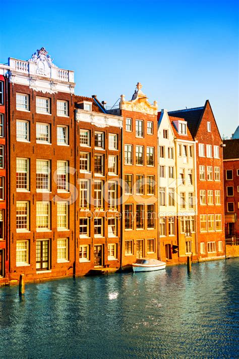 Typical Dutch Houses In The Center Of Amsterdam Stock Photo Royalty