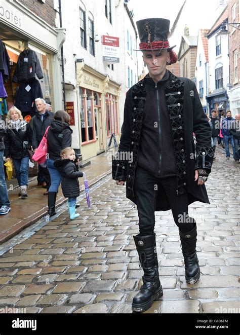 An Attendee Walks Through Town Whitby Goth Weekend In Whitby Hi Res