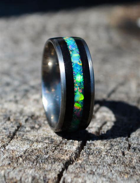 See how the angles of the square fold make a good contrast with the spirals: Wood opal inlay ring | titanium opal rings | engagement ...