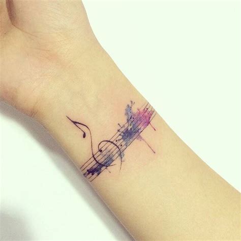 There are many nerves and veins that run along your inner wrists, so this area can be very sensitive. Watercolor music staff tattoo on the inner wrist.