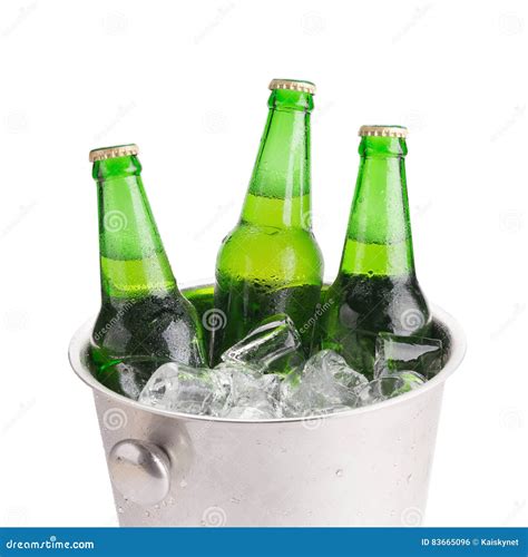 Cold Bottles Of Beer In Bucket With Ice On White Background Stock