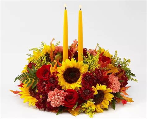 Planting flowers that attract bees may help small colonies in peril through a time of. Sunny Centerpiece with Candles in Glendale, CA | Honey Bee ...