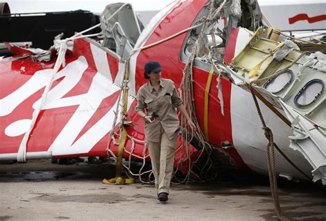Airasia Flight Qz8501 Airasia Tragedy Pictures Cbs News