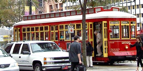 New Orleans Louisiana Trolley On Road Notable Travels Notable Travels