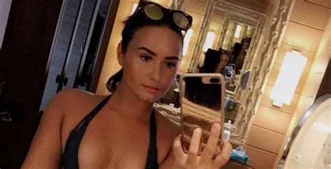 Demi Lovato Shows Off Major Cleavage In Swimsuit Selfies