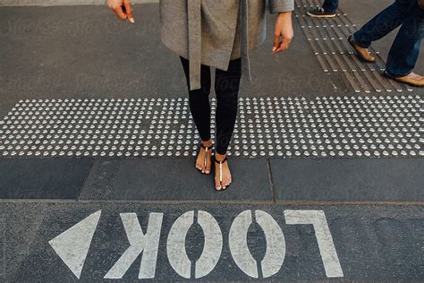 woman crosses australian streets by stocksy contributor jayme burrows stocksy