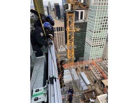 Photos Police Rescue Would Be Jumper From Midtown High Rise Midtown