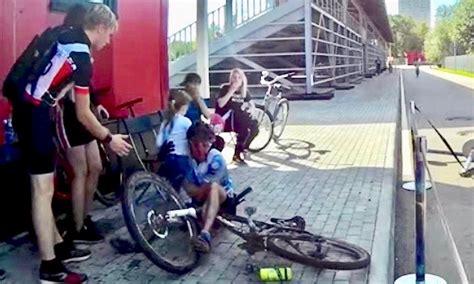 Crashing Cyclist Grabs Girl To Avoid Catastrophe