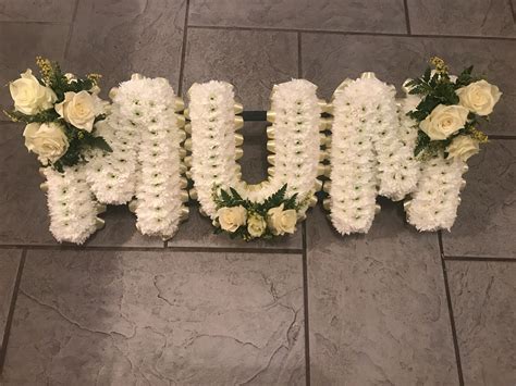 For classic, affordable funeral flowers uk wide. Cream and white Mum letters funeral tribute flowers ...