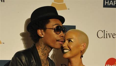 amber rose and wiz khalifa get close for easter