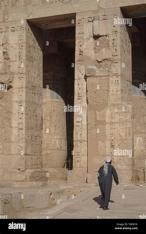 luxor egypt man in a traditional egyptian robe jellabiya at medinet habu the mortuary