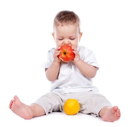 Pretty Little Girl Biting An Apple Stock Photo Image Of Hand Infant