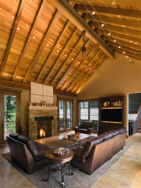 Vaulted ceilings, while similar, do not share the same pitch as the roof, and are often framed using scissor trusses. Cathedral Ceiling Light Home Design Ideas, Pictures ...