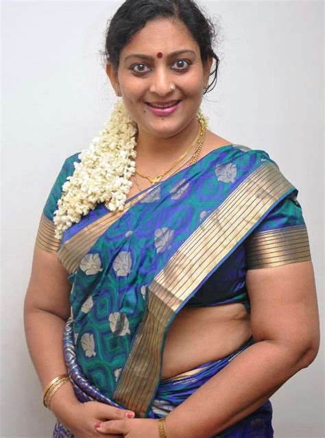 mallu kerala aunty unni mary extra large melons hot body curves showing in spicy saree stills