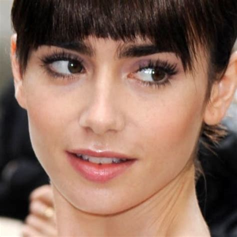 Lily Collins Makeup Black Eyeshadow Taupe Eyeshadow And Clear Lip Gloss
