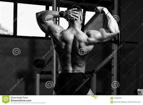 Muscular Man Flexing Muscles In Gym Stock Image Image Of Abdominal