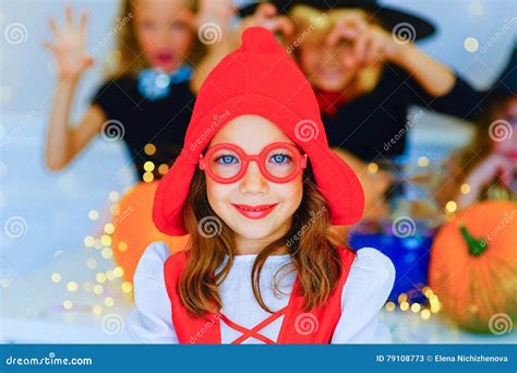 Happy Group Of Children In Costumes During Halloween Party Stock Image