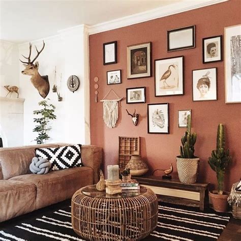 A Gorgeous Boho Living Room With A Terracotta Wall A Gallery Wall